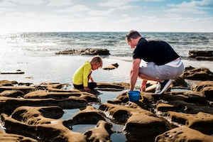 Exploring rock pools, one of the best free things to do with kids on the Isle of Wight